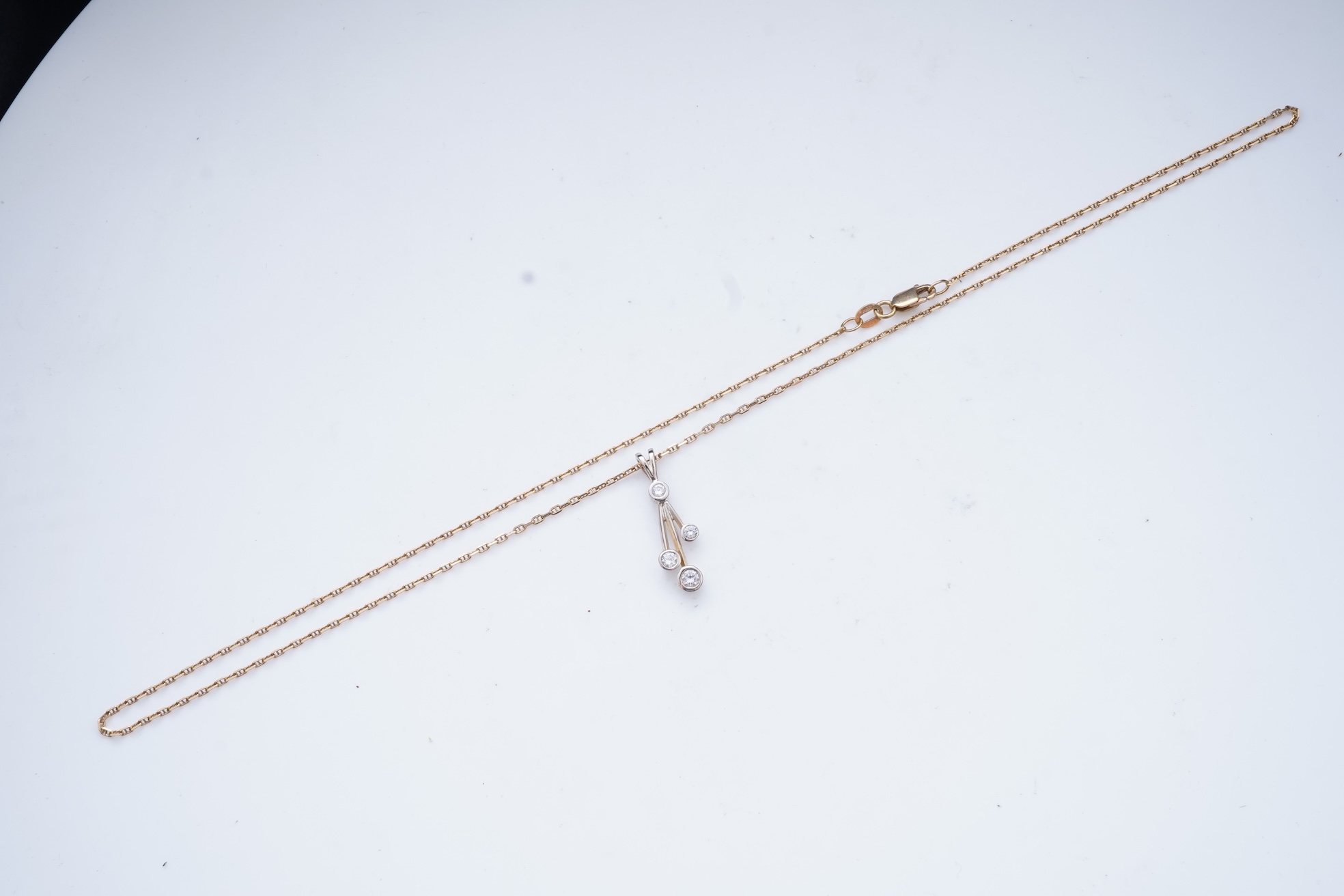 A diamond pendant necklace